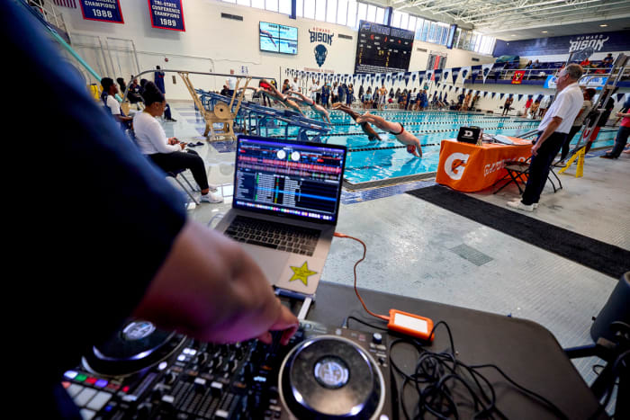 College meets are often friends-and-family-only affairs. Bringing in a DJ was part of Askew’s plan to change that.